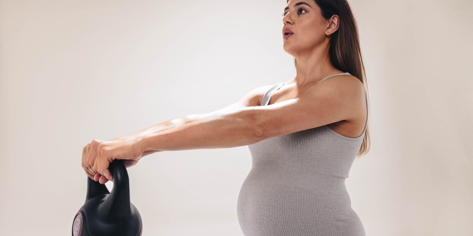 Should I Continue Lifting Weights While I Am Pregnant?
